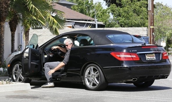 Ron getting out of his Mercedes Benz E350
